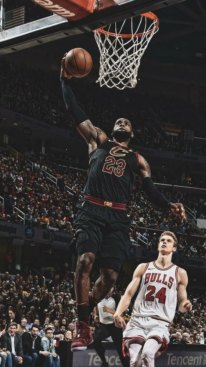 black cleveland cavaliers uniform worn by lebron james cool nba wallpapers jumping in the air about to dunk the ball