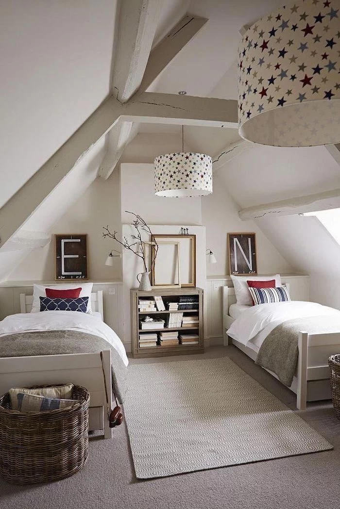 cathedral ceiling with exposed wood beams two single beds bookshelf between them teen girl room ideas gray carpet