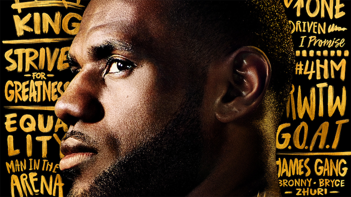 close up photo of lebron from the side lebron james wallpaper different things written in gold around him