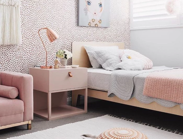 gold dots on white wall pink velvet sofa single bed pink night stand teen girl room decor white carpet on the floor with small sitting pillow