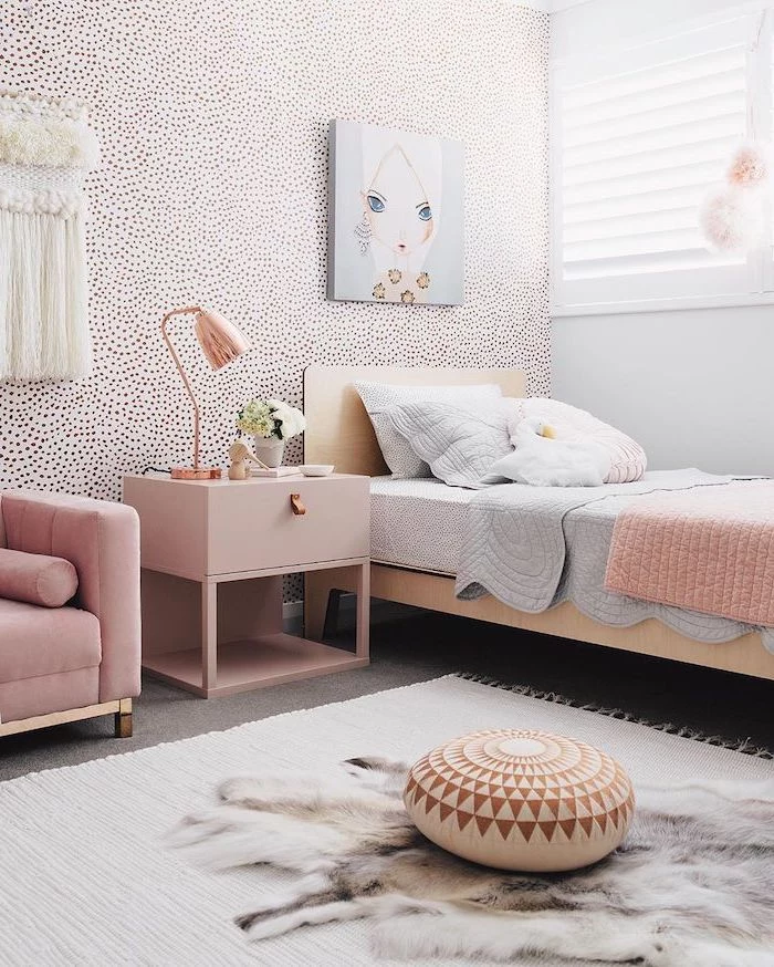 gold dots on white wall pink velvet sofa single bed pink night stand teen girl room decor white carpet on the floor with small sitting pillow