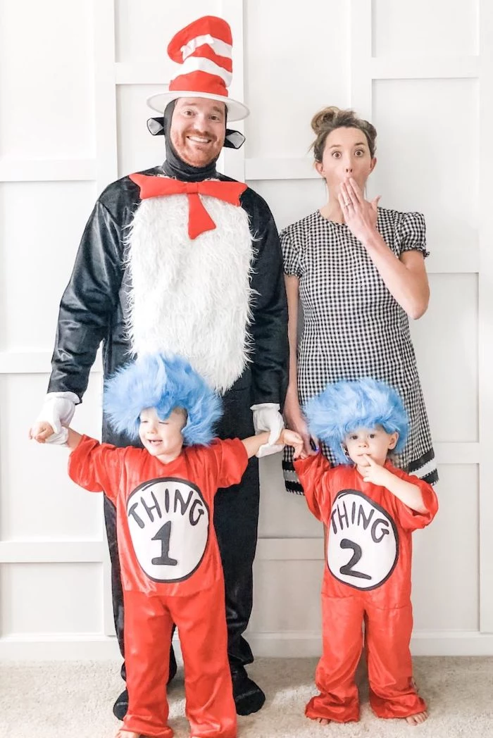 halloween costumes for three people family of four dressed as characters from the cat in the hat kids as thing one and thing two