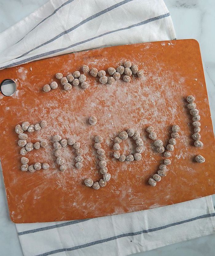 how to make boba tapioca pearls arranged on wooden cutting board spelling the word enjoy with exclamation mark