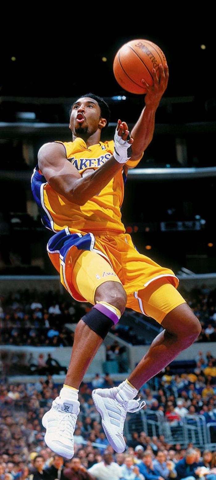 kobe bryant wallpaper iphone photo of kobe with number eight lakers jersey in the air shooting the ball