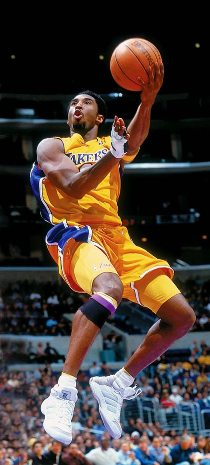 kobe bryant wallpaper iphone photo of kobe with number eight lakers jersey in the air shooting the ball