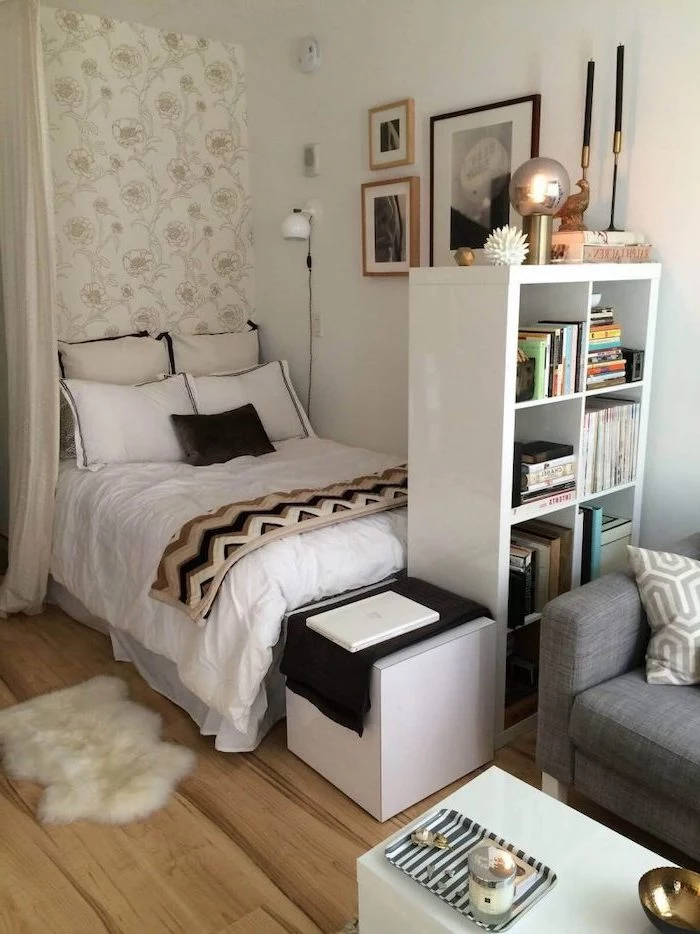 niche with bed behind bookshelf teenage girl bedroom ideas white walls with framed art gray couch wooden floor