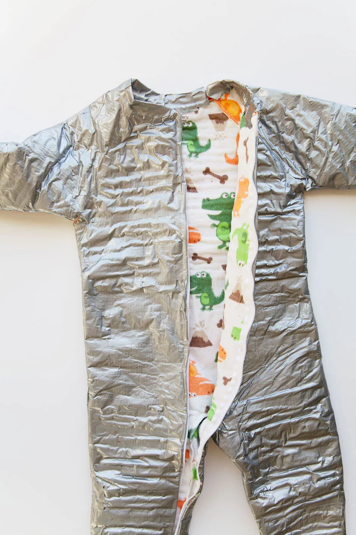 onesie covered with gray duct tape placed on white surface creative halloween costumes step by step diy tutorial