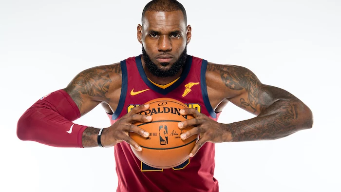 photo of lebron james wearing cleveland cavaliers uniform holding a basketball lebron wallpaper white background