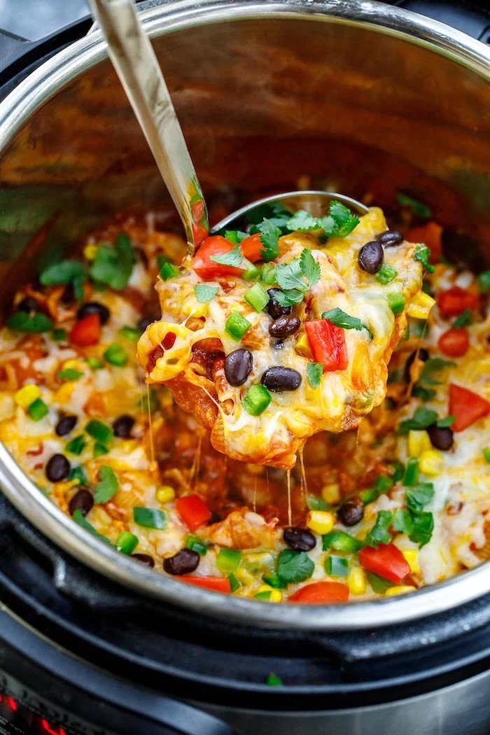 taco paste with black beans peppers corn cheese garnished with parsley instant pot chicken recipes healthy