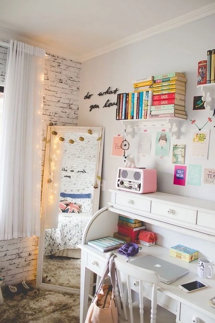 white brick wall white desk with bookshelves above it cozy teenage girl room tall mirror with fairy lights around it