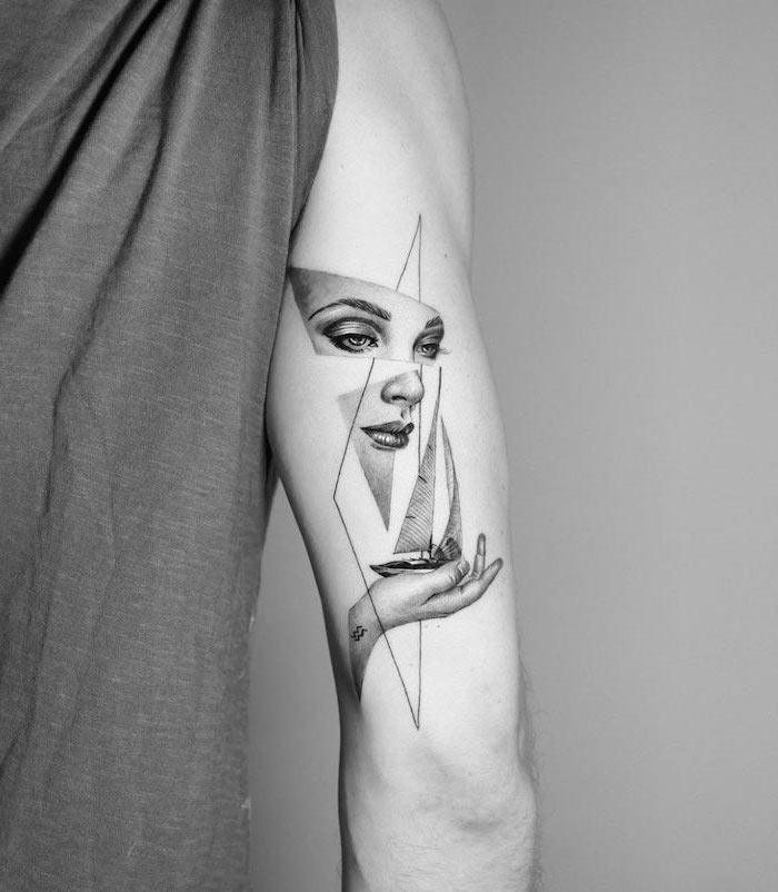 abstract back of arm tattoo of female face and hand geometric tattoo designs for men black and white photo