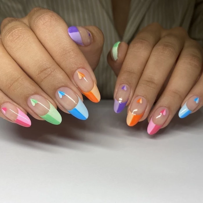 acrylic nail designs long almond nails french manicure in shades of blue orange pink green purple with hearts on the bottom