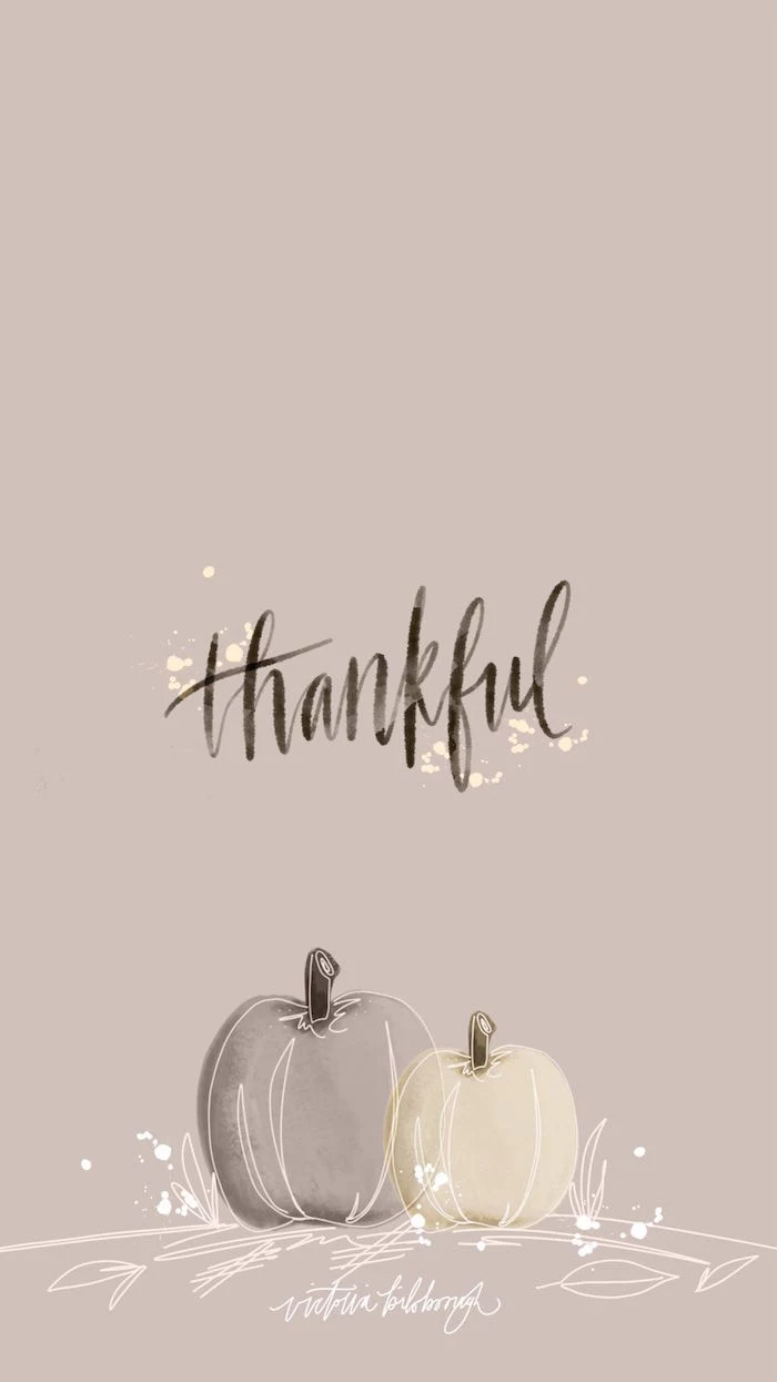 black cursive font thankful written over drawings of two pumpkins free thanksgiving wallpaper light pink background