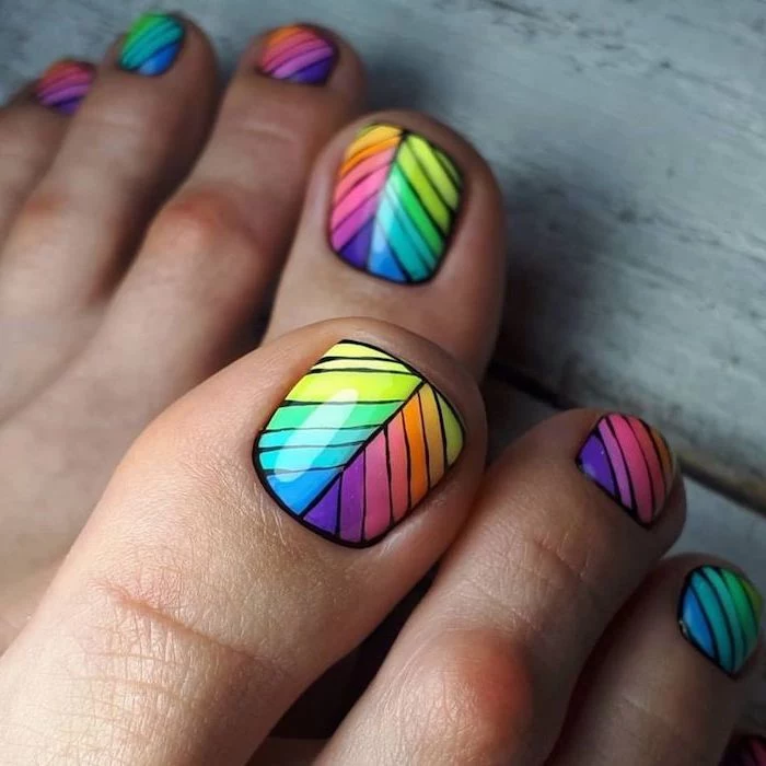 blue green yellow purple pink orange lines on nails with black outlines cute nail designs pedicure