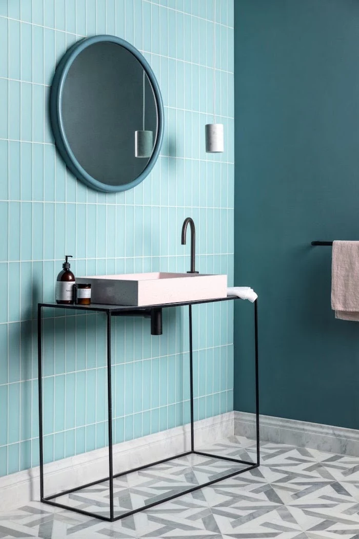 blue mint green tiles on the wall behind the sink with mirror bathroom wall tile ideas gray and white tiles on the floor with geometrical pattern