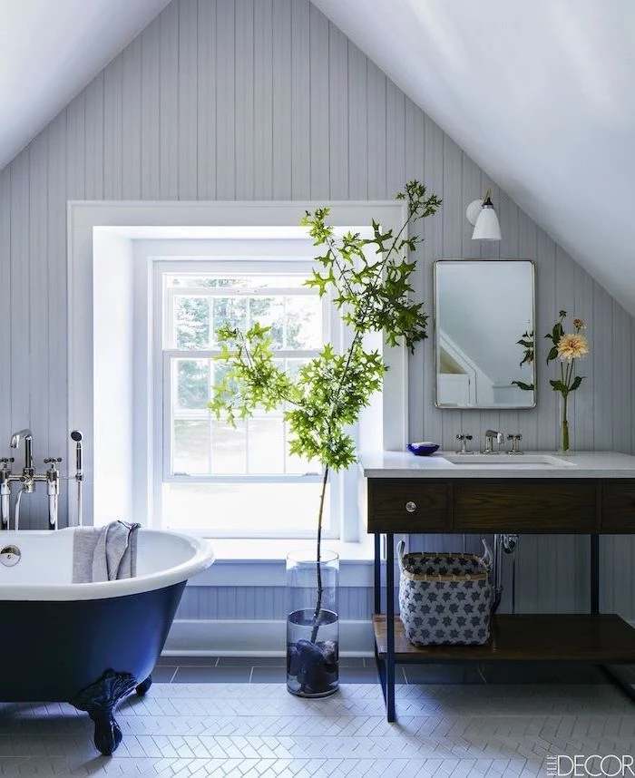 blue white vintage bath farmhouse bathroom tile white shiplap on the walls wooden vanity with open shelving