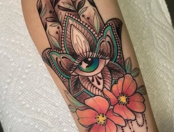 colorful hamsa hand with all seeing eye flowers tattoos with meaning of life forearm tattoo