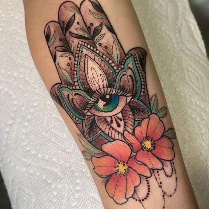 colorful hamsa hand with all seeing eye flowers tattoos with meaning of life forearm tattoo