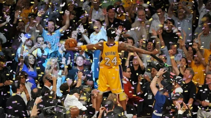 cool nba wallpapers kobe bryant standing on announcers table crowd looking at him holding a basketball