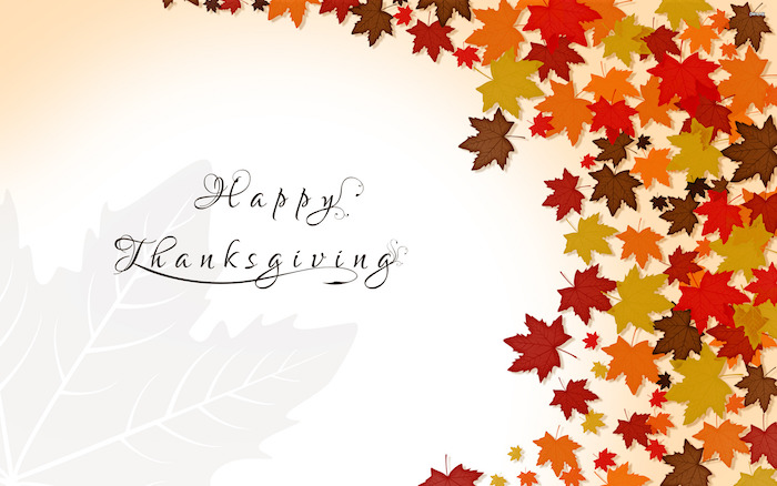 drawing of fall leaves in orange yellow red brown on the side cute thanksgiving wallpaper happy thanksgiving written in black cursive font