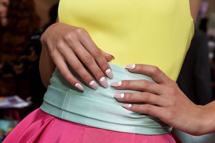 french manicure in white with white outlines on nude nail polish cute acrylic nails medium length almond nails