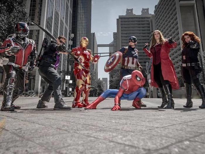 funny group halloween costumes seven people dressed as the avengers ant man spider man hawkeye iron man caprain america black widow scarlet witch