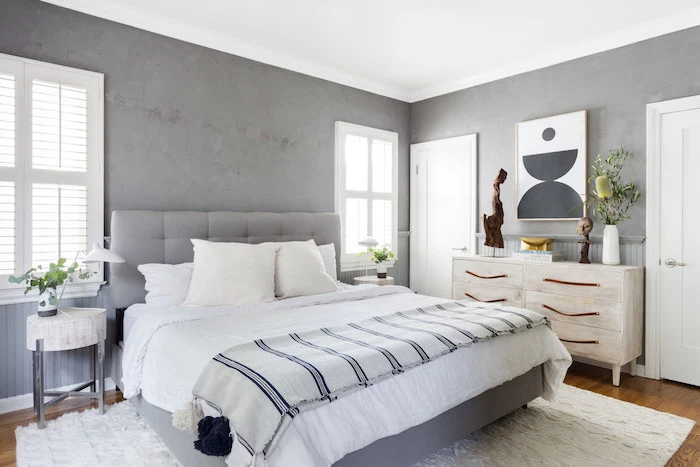 granite gray walls wooden vanity white carpet under the bed on wooden floor what is scandinavian