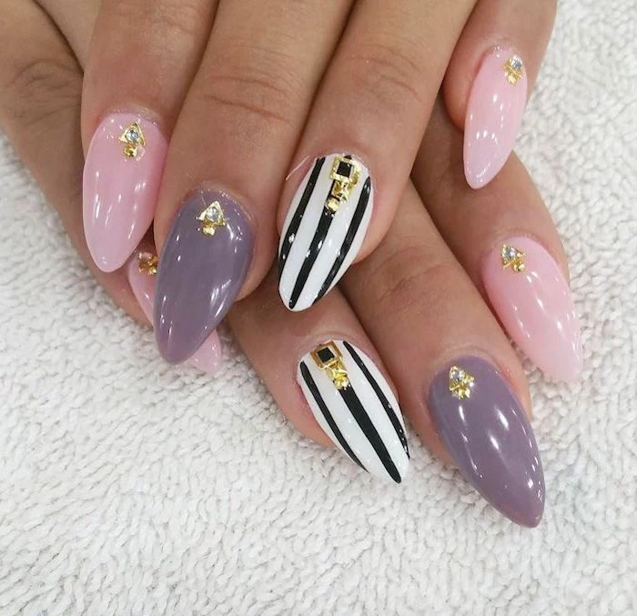 gray and pink nail polish with rhinestones short acrylic nails black and white stripes on ring fingers long nails with almond shape