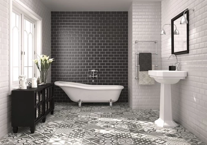gray and white printed tiles on the floor black subway tiles accent wall behind the bathtub bathroom tile ideas white subway tiles on the rest of the walls