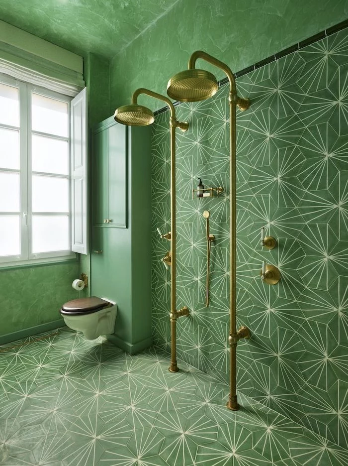 green honeycomb tiles on the floor and walls with white print bathroom shower tile ideas brass gold shower heads