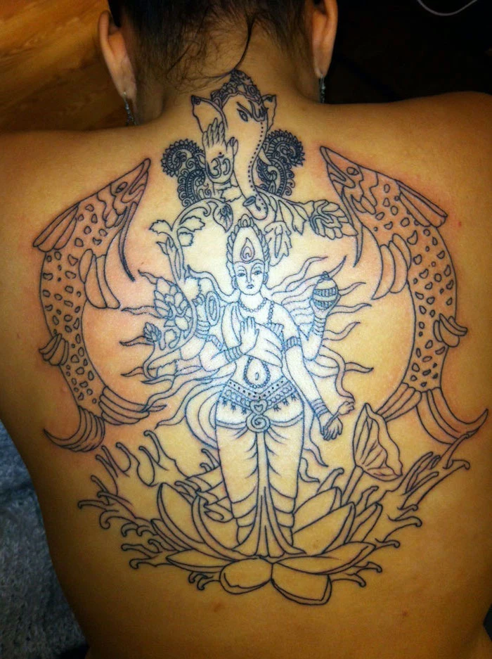 hindu goddess with many hands standing on lotus flower fish around her symbols with deep meanings ganesha with om symbol back tattoo