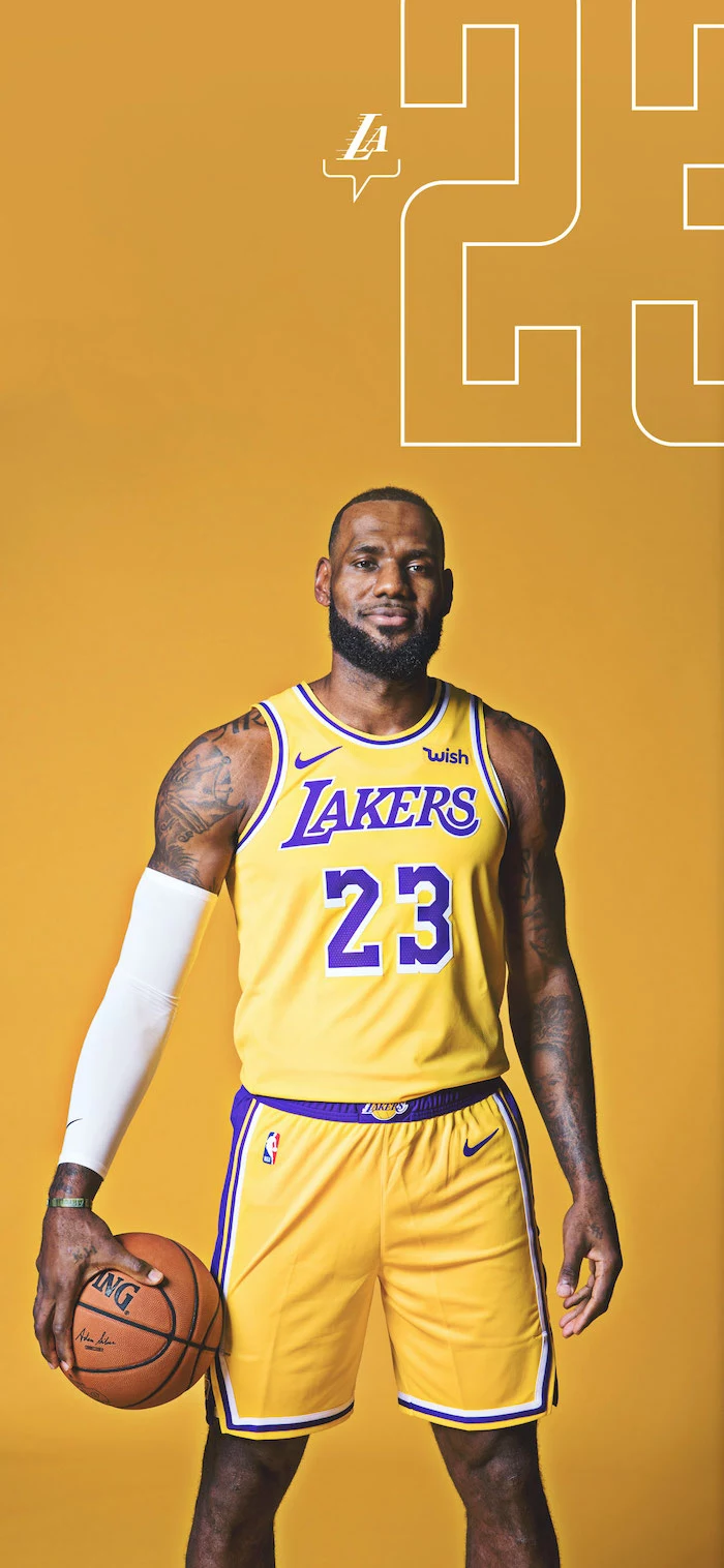 lakers wallpaper iphone lebron james wallpaper wearing gold lakers uniform holding basketball on yellow background