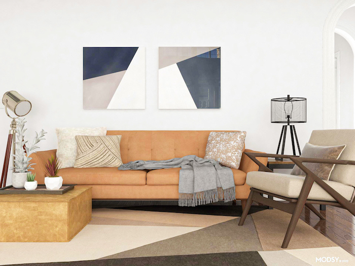 orange sofa with throw pillows gray armchair mid century modern table geometric carpet on wooden floor