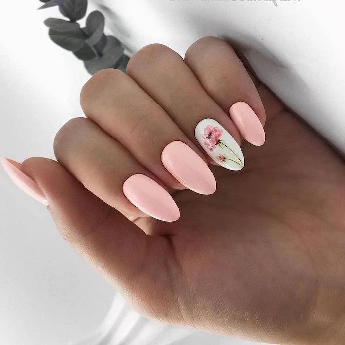 pink nail polish on long almond nails cute nail ideas white nail polish peony flower decoration on ring finger