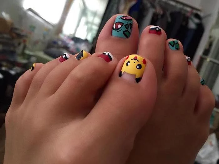 pokemon pedicure almond shaped nails different pokemon character drawn on each nail