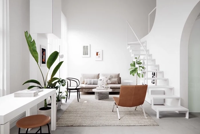 scandinavian design living room brown leather armchair gray sofa beige caroet on tiled floor