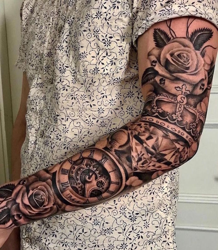 Forearm Tattoos For Men   Sleeve Tattoo On Man Wearing White Shirt Forearm Tattoos For Men Roses With Compass Diamond Crown 