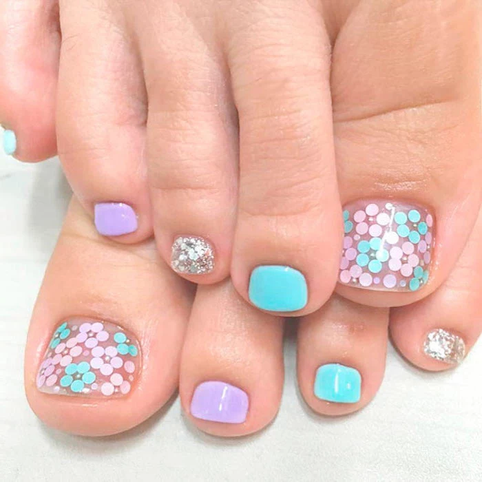summer acrylic nail designs blue purple and silver glitter nail polish flower decorations on toes