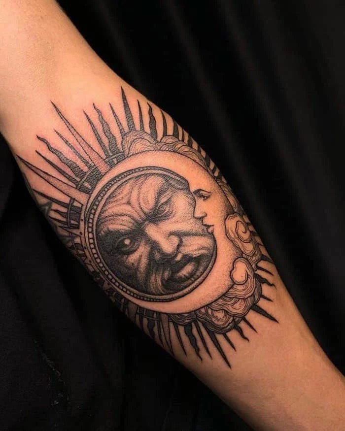 tattoos that mean strength sun and moon connected together with male and female face forearm tattoo