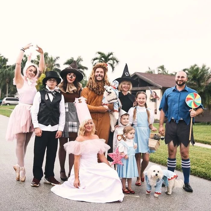 ten people dressed as characters from the wizard of oz photographed on the street halloween costume ideas for girls