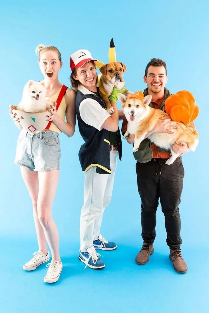 three people dressed as pokemon characters group halloween costumes dogs disguised as pokemons