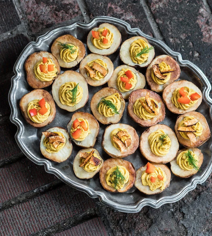 vegan appetizer recipes deviled potatoes halved baked filled with egg mixture garnished with tomatoes dill