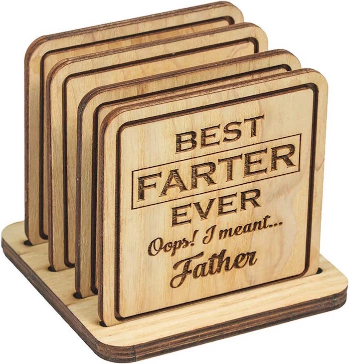 best farter ever oops i meant father best gifts for dad funny wooden coasters set photographed on white background