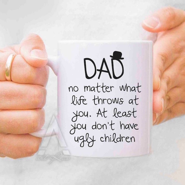coffee mug with personalised message gifts for dad from daughter white mug with black letters held by two arms