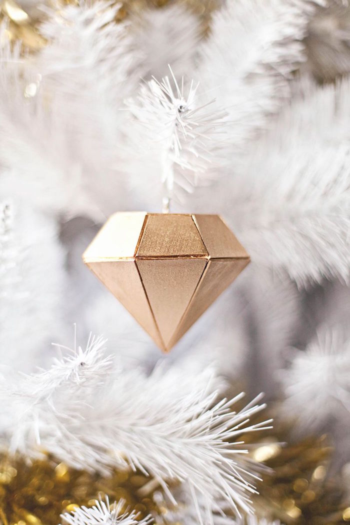 diamond shaped wood ornament unique christmas ornaments close up photo hanging on faux white tree