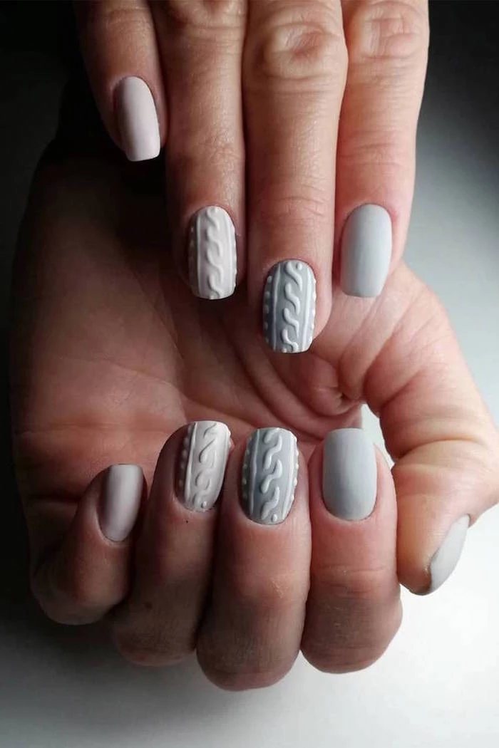 gray and nude nail polish sweater pattern decoration on middle and ring finger cute christmas nails