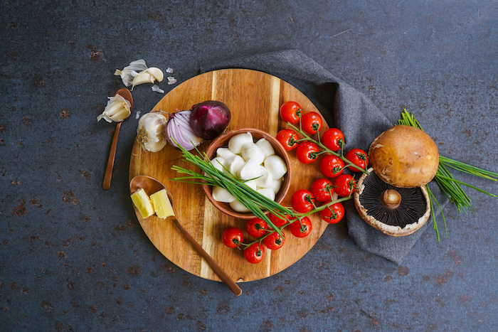 ingredients laid out on gray surface what to make on thanksgiving stuffed portobello mushrooms recipe