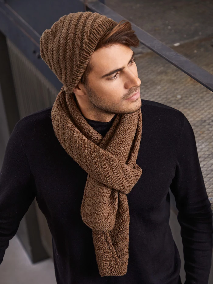 man wearing black sweater christmas gift ideas for dad knitted brown scarf and beanie set