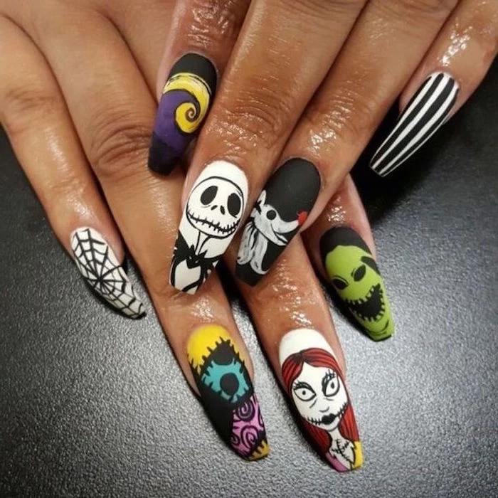 nightmare before christmas inspired nails in different colors christmas nails long coffin nails