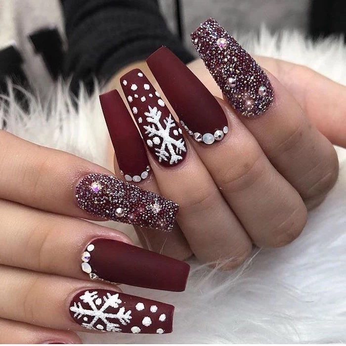 red matte nail polish decorations with rhinestones and white snowflakes christmas nails very long coffin nails